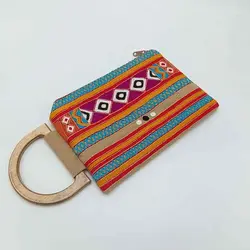 کیف کلاچ گلابتون دوزی دسته چوبی بنفش