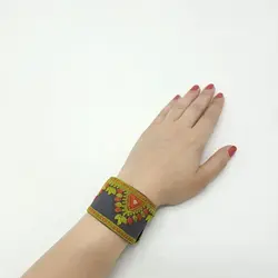 دستبند سوزن‌دوزی بلوچی گیشو (سبز ـ نارنجی)