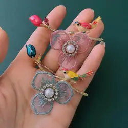 گلسینه پرنده و شاخه گل