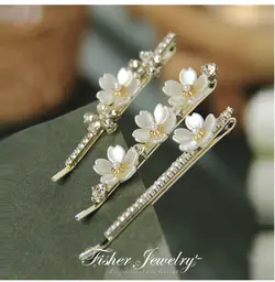 سنجاق سر گل های صدفی