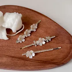 سنجاق سر گل های صدفی