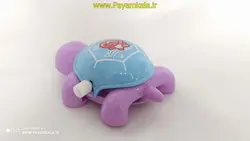 اسباب بازی کوکی لاک پشت بنفش-آبی (کد606)