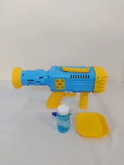 بازوکا حباب ساز رگباری 36 سوراخ باطری خور بهمراه مایع کوچک