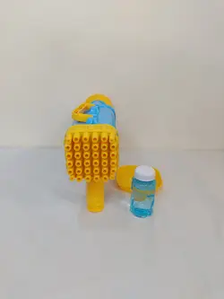 بازوکا حباب ساز رگباری 36 سوراخ باطری خور بهمراه مایع کوچک