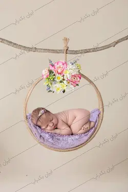 بک دراپ نوزاد حلقه آویز با رز های بنفش کد IBD-3922