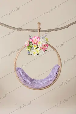 بک دراپ نوزاد حلقه آویز با رز های بنفش کد IBD-3922