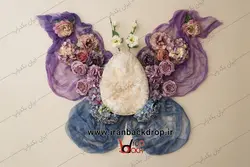 بک دراپ نوزاد پروانه بهاری با گل های رنگارنگ کد IBD-5465