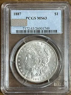 سکه نقره یک دلاری گرید شده تکرار نشدنی مورگان کشور آمریکا سال ۱۸۸۷  *