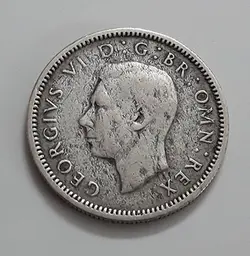 سکه خارجی نقره ۶ پنس کشور بریتانیا شاه جرج ششم سال ۱۹۳۸