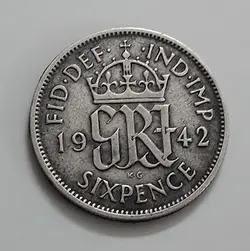 سکه خارجی نقره ۶ پنس کشور بریتانیا شاه جرج ششم سال ۱۹۴۲