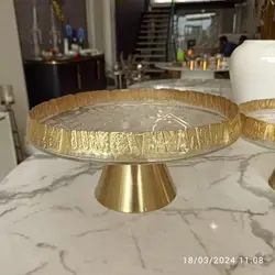 ظرف پذیرایی پایه دار بلور دفرمه نوار طلایی با پایه استیل ویژه نوروز برای شیرینی خوری و میوه خوری