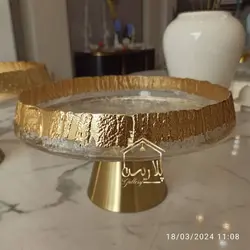 ظرف پذیرایی پایه دار بلور دفرمه نوار طلایی با پایه استیل ویژه نوروز برای شیرینی خوری و میوه خوری