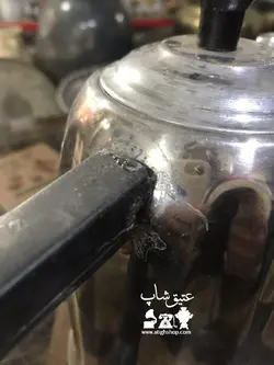 کتری برنجی روسی قدیمی با مدلی خاص مهردار ارتفاع تا دسته ۳۲ سانت سالم و تمیز