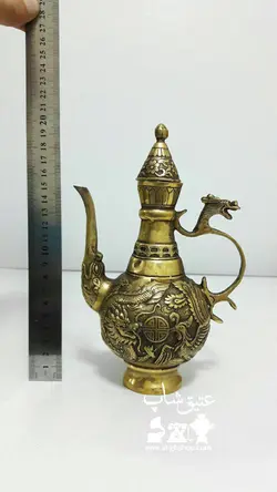 گلاب پاش برنزی نقش برجسته ارتفاع ۲۰ سانت طول ۱۳/۵ سانت