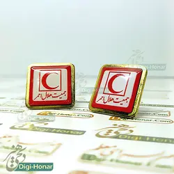 گل يقعه و نشان کت،بج با آرم هلال احمر کشور با زمنيه فلزي براقي طلايي