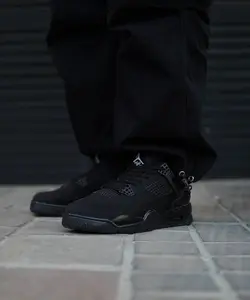 کتونی ورزشی نایک ایر جردن 4 بلک کت Nike Air Jordan 4 Black Cat