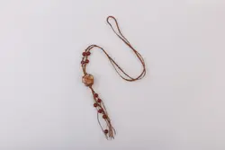 گردنبند راف اونتورین پرتقالی مکرومه بافی شده به همراه مهره های عقیق قرمز - آسمون | فروشگاه سنگ و جواهرات