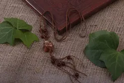 گردنبند راف اونتورین پرتقالی مکرومه بافی شده به همراه مهره های عقیق قرمز - آسمون | فروشگاه سنگ و جواهرات