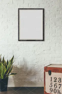 موکاپ تابلو به دیوار چسبیده شده  در نماهای مختلف منزل و سالن پذیرایی