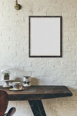 موکاپ تابلو به دیوار چسبیده شده  در نماهای مختلف منزل و سالن پذیرایی