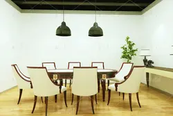 موکاپ دفتر  و تابلو های به دیوار زده شده در فضای سالن شرکت