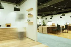 موکاپ دفتر  و تابلو های به دیوار زده شده در فضای سالن شرکت