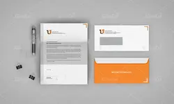 موکاپ ست اداری سفید و نارنجی با تبلت و لباس وکلاه