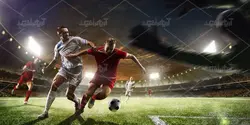 عکس با کیفیت بازیکن فوتبال در حال دفاع کردن از دروازه هنگام گل زدن تیم حریف
