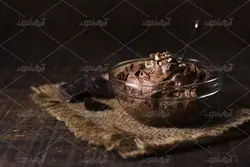 عکس با کیفیت بستنی شکلاتی با ظرف شیشه ای