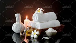 دانلود عکس با کیفیت لوازم جانبی ماساژ آبگرم با روغن حوله شمع سفیدو پودر و گل