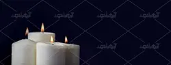 دانلود عکس با کیفیت سه شمع روشن سفید با پس زمینه تاریک