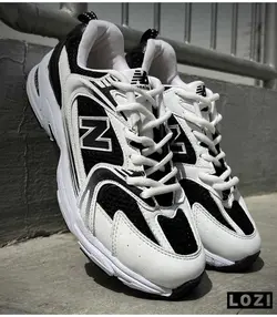 کفش کتانی مردانه سفید مشکی New Balance 530 مدل 3101