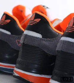 کفش کتانی مردانه طوسی سفید نارنجی آدیداس adidas ZX 750 مدل 3323