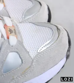 کفش کتانی مردانه طوسی سفید نارنجی آدیداس adidas ZX 750 مدل 3323