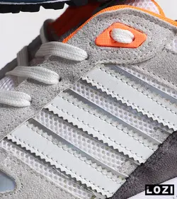 کفش کتانی مردانه طوسی سفید نارنجی آدیداس adidas ZX 750 مدل 3323