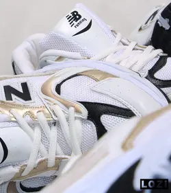 کفش کتانی مردانه سفید طلایی نیوبالانس New Balance 530 مدل 3273