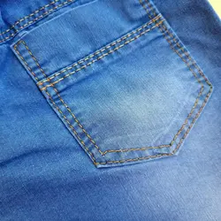 شلوارک لی دخترانه طرح ستاره گلدوزی شده با کمر کشی دارای چهار جیب پشت و پهلو