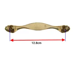 دستگیره کابینت دو پیچ طلایی فلزی مدل پرنس طرح دار طول 15.5 سانتی‌متر