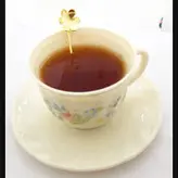 قاشق چای خوری برنجی دستساز طرح گل مدل 15689