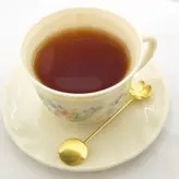 قاشق چای خوری برنجی دستساز طرح گل مدل 15689