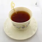 قاشق چای خوری دستساز برنجی عزیزی طرح پرنده
