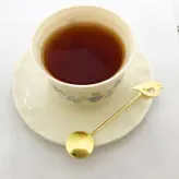 قاشق چای خوری دستساز برنجی عزیزی طرح پرنده
