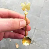 قاشق چای خوری دستساز برنجی عزیزی مدل پروانه