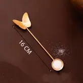 قاشق برنجی دستساز گالری عزیزی مدل پروانه