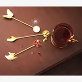قاشق برنجی دستساز گالری عزیزی مدل گل شیپوری