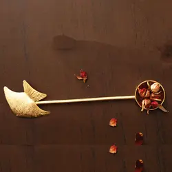 قاشق برنجی دستساز گالری عزیزی مدل ماهی