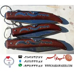 چاقوی دستسازاوکاپی افریقای جنوبی ضامن دار و کلکسیونی همراه با حک نام و نشان و سازنده روی تیغه و دسته چوبی خاص okapi