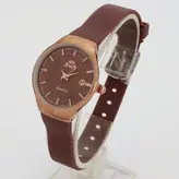 ساعت مچی عقربه ای دخترانه بندسیلیکونی قهوه ای اسپرت رنگی تاریخ شمار