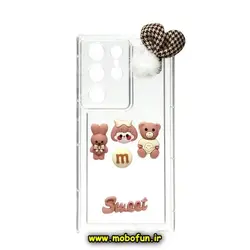 قاب گوشی Galaxy S23 Ultra سامسونگ طرح شفاف ژله ای سه بعدی برجسته عروسکی SWEET محافظ لنز دار پام پام گلبهی کد 242