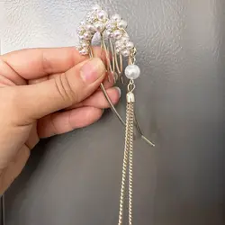 کانزاشی شانه دار مرواریدی زایا